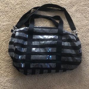 Stripped sequin zippered bag